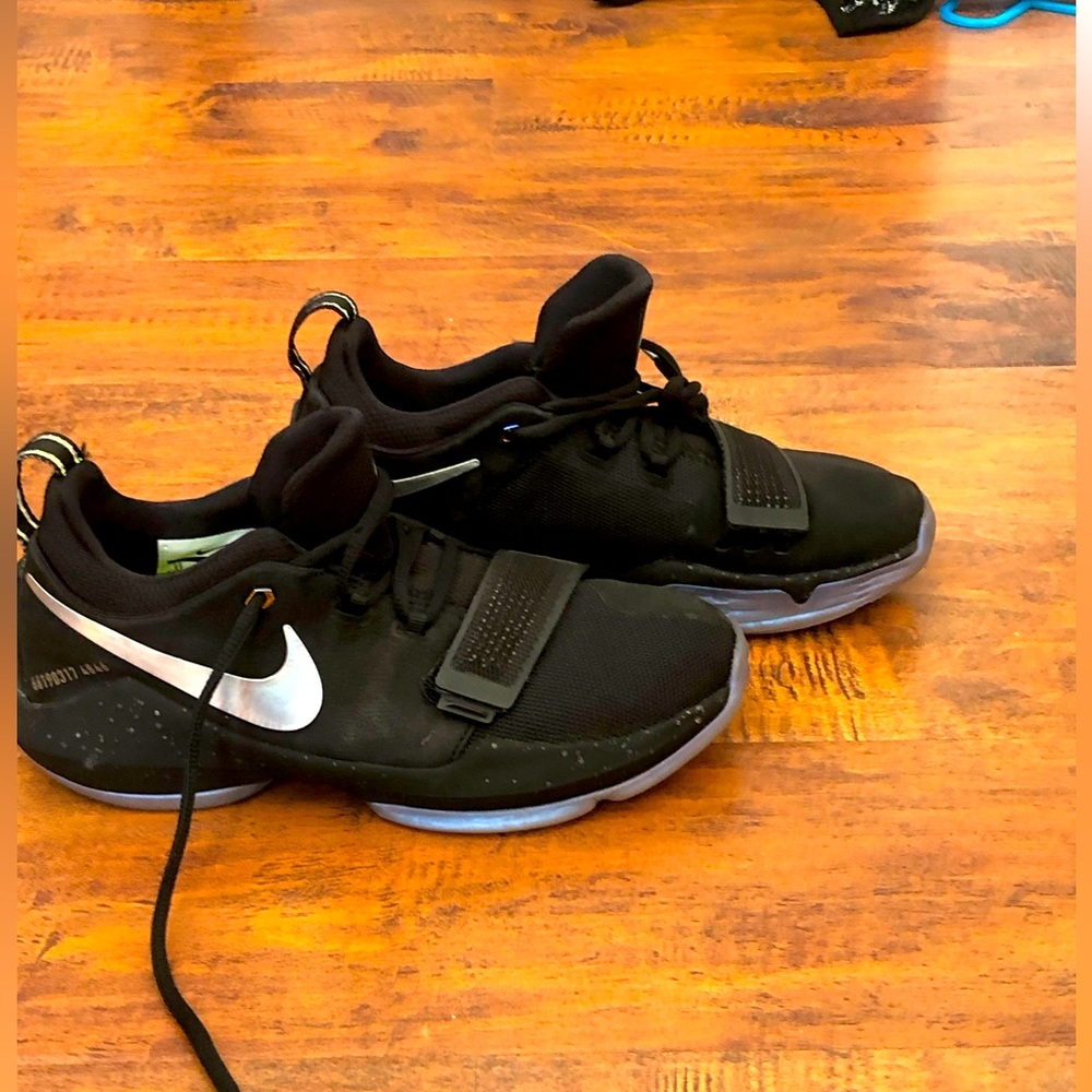Hard to photo- these are rare Nike Paul George- silver and black!